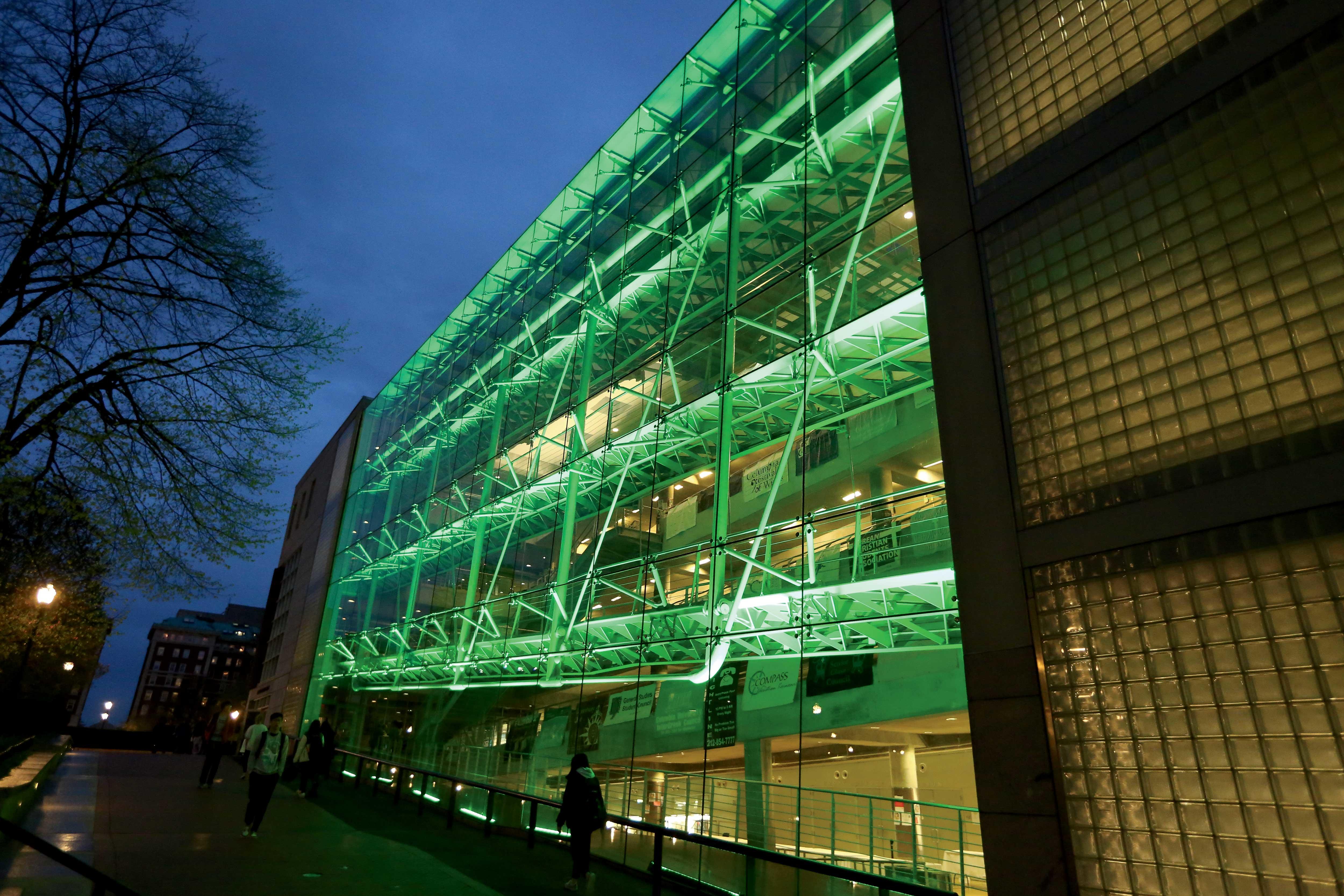 Lerner Hall lit up green