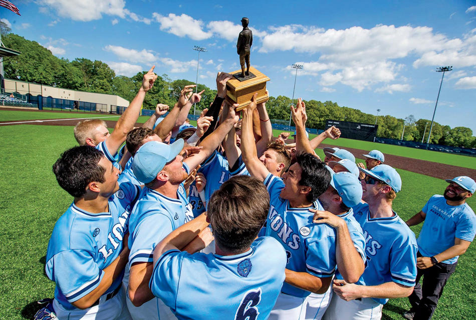 The Columbia Lions baseball team with a trophy