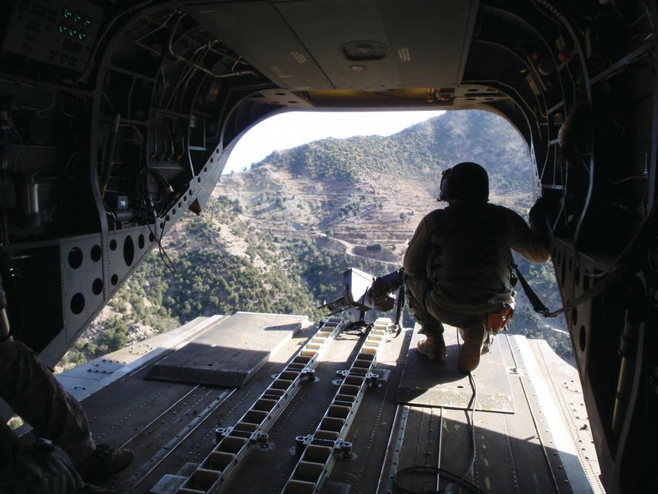 The view from the back of a CH-47 as American and Afghan soldiers descend into the Kunar River Valley along the Afghan-Pakistani border. (Jason Dempsey)