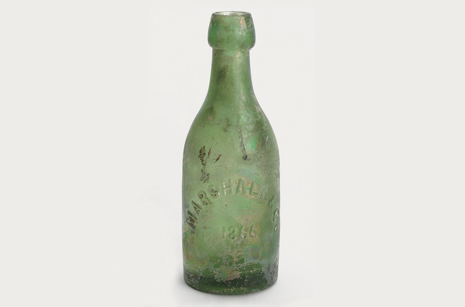 A green glass bottle