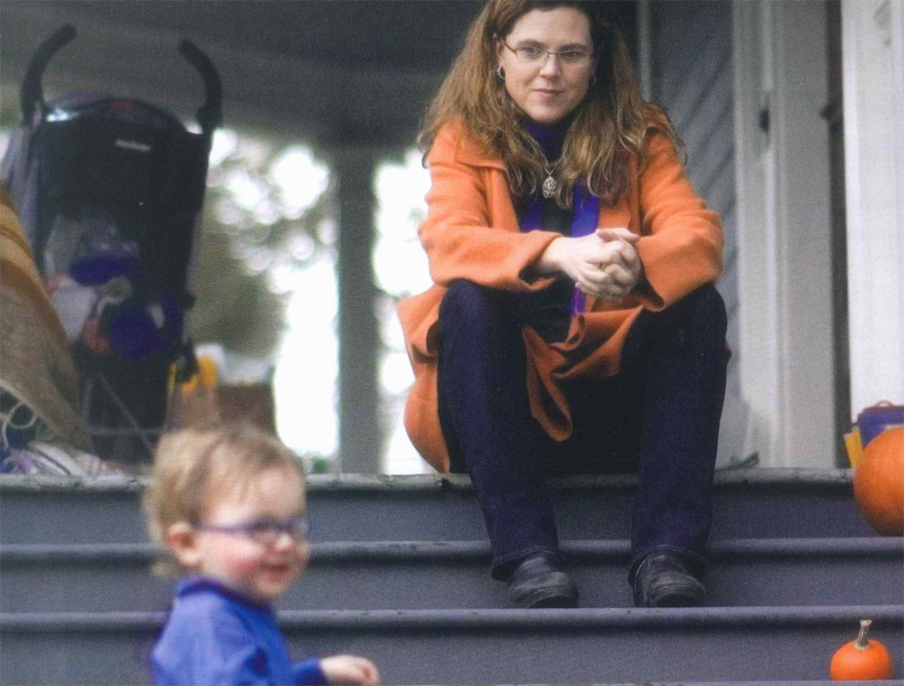 Taylor Brodsky with child, photographed by Chris Ho