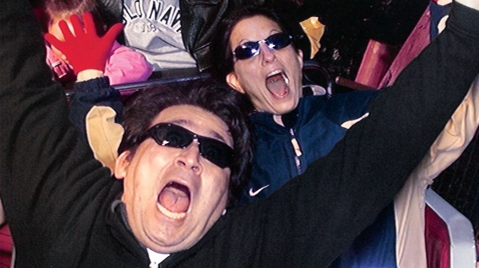 Photo of Martin and Cheryl Lewison on a roller coaster