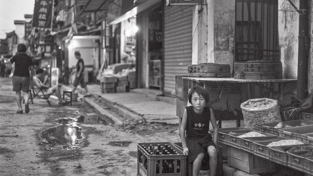Photo of boy on Shanghai street, by Howard French