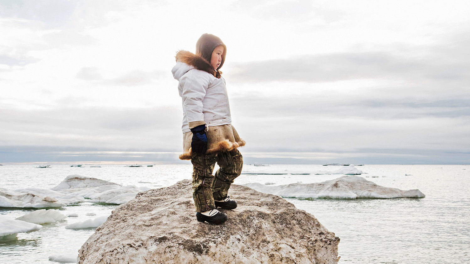 Photo of an Inuit child by Katie Orlinsky 