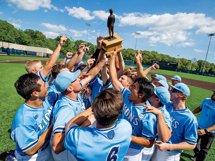 The Columbia Lions baseball team with a trophy