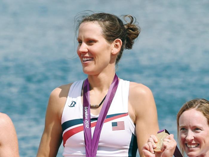Rower Caryn Davies accepting gold medal at 2012 Summer Olympics
