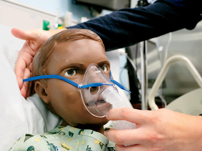 A patient simulation robot with a breathing mask at the Columbia University School of Nursing