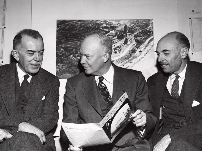 Dwight Eisenhower reading Columbia Alumni News in 1949 with James Kip Finch and Felix E. Wormser