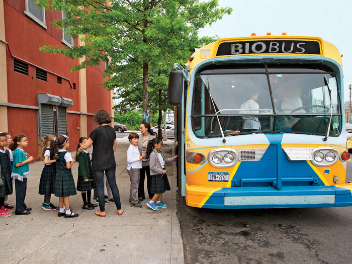 Schoolchildren entering the BioBus