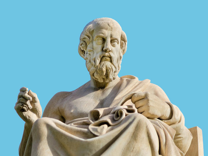 Statue of Plato against blue background