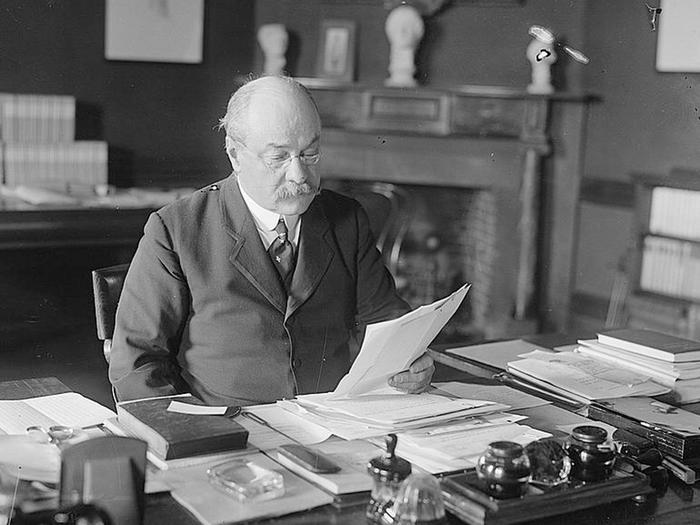 Nicholas Murray Butler photographed at desk in 1916 (Library of Congress)