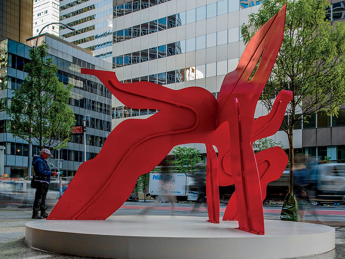 Flying Red sculpture by Ann Gillen at 909 Third Avenue in New York City