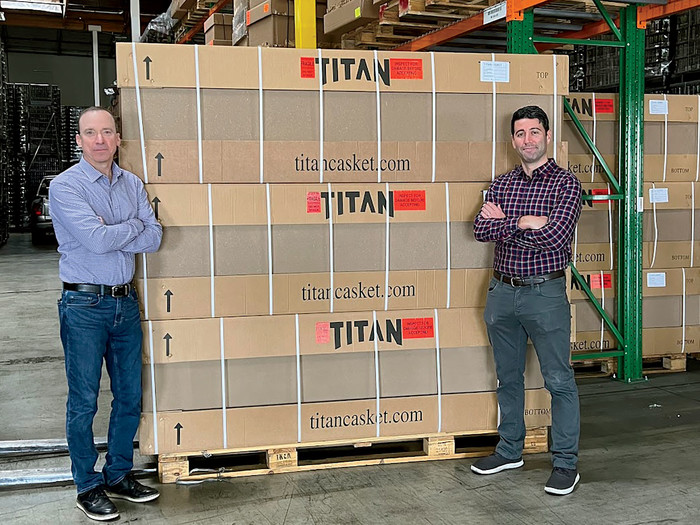 Scott Ginsberg and Joshua Siegel at the Titan Caskets warehouse