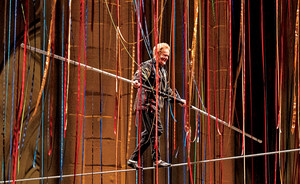 Philippe Petit walking on a tightrope in the Cathedral of St. John the Divine in 2024