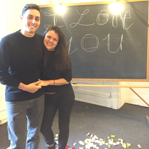 A couple gets engaged at Columbia University's Buell Hall