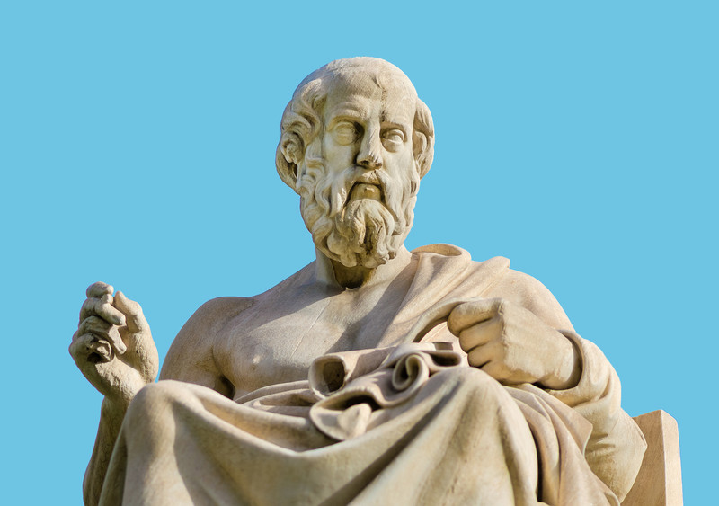 Statue of Plato against blue background
