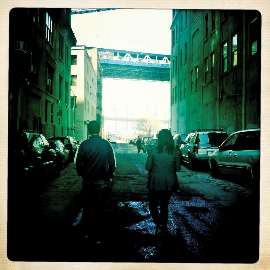 Jen Chung and Jake Dobkin in front of Manhattan Bridge
