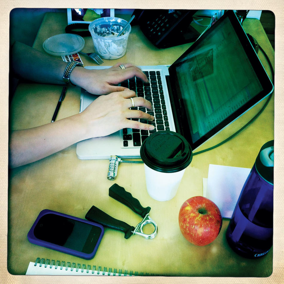 Instagram-style photo of person typing on laptop