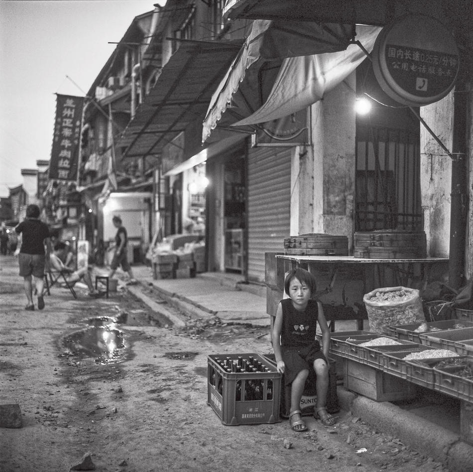 Photo of boy on Shanghai street, by Howard French