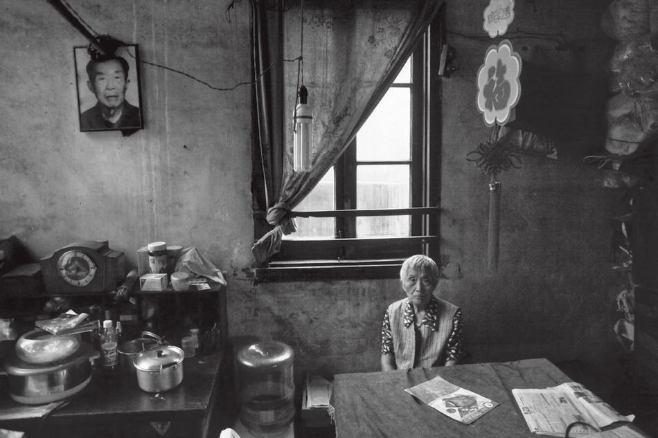 Photo of woman in apartment in Shanghai, by Howard French