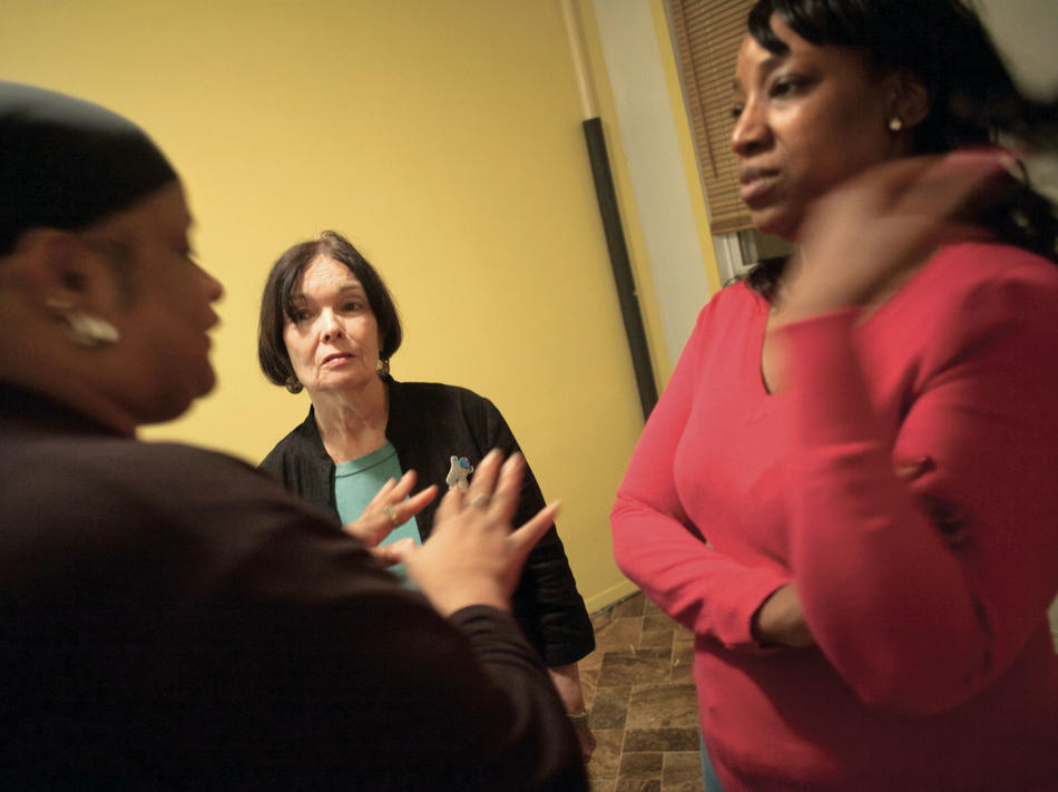 Mary Byrne speaks with case managers at Brooklyn's Drew House