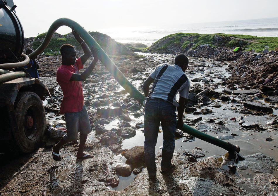 Sewage treatment technicians in Accra, Ghana