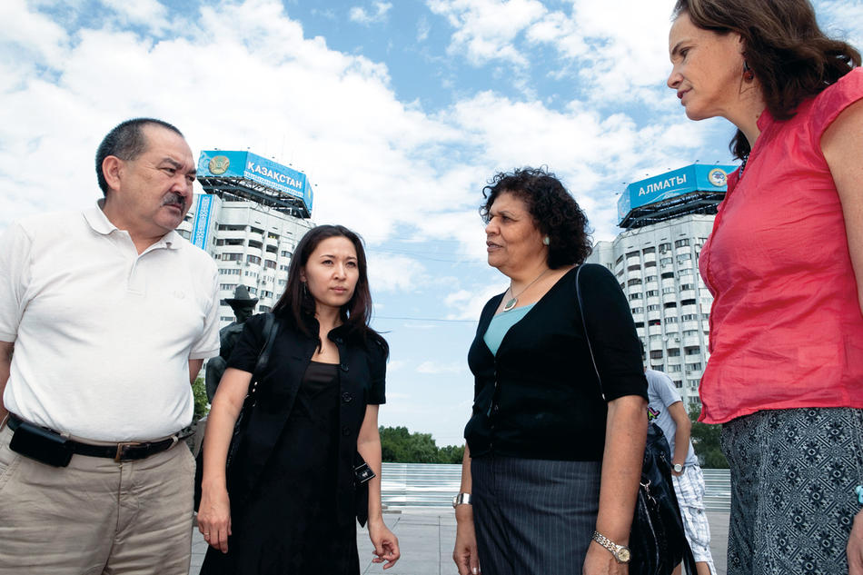 Assel Terlikbayeva, professor Nabila El-Bassel, and Louisa Gilbert in Republic Square, Almaty, Kazakhstan. 