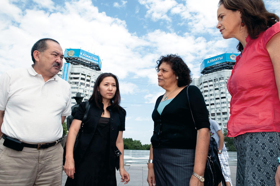 Assel Terlikbayeva, professor Nabila El-Bassel, and Louisa Gilbert in Republic Square, Almaty, Kazakhstan.