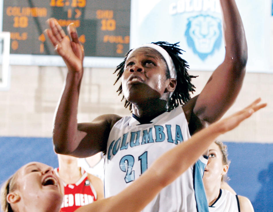 Judie Lomax playing basketball