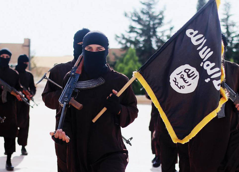 ISIS members marching with flag