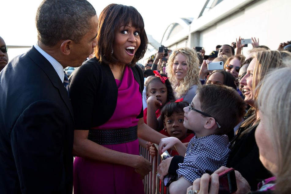 Barack and Michelle Obama meeting crowd