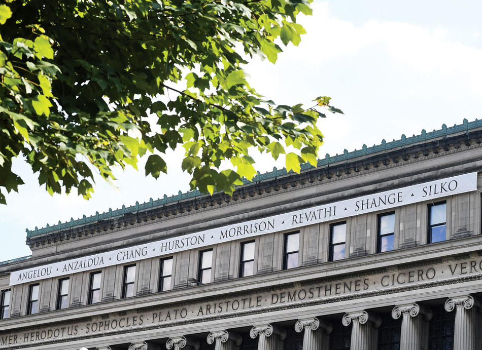 Women writers' names on Columbia Butler Library, over names of male writers