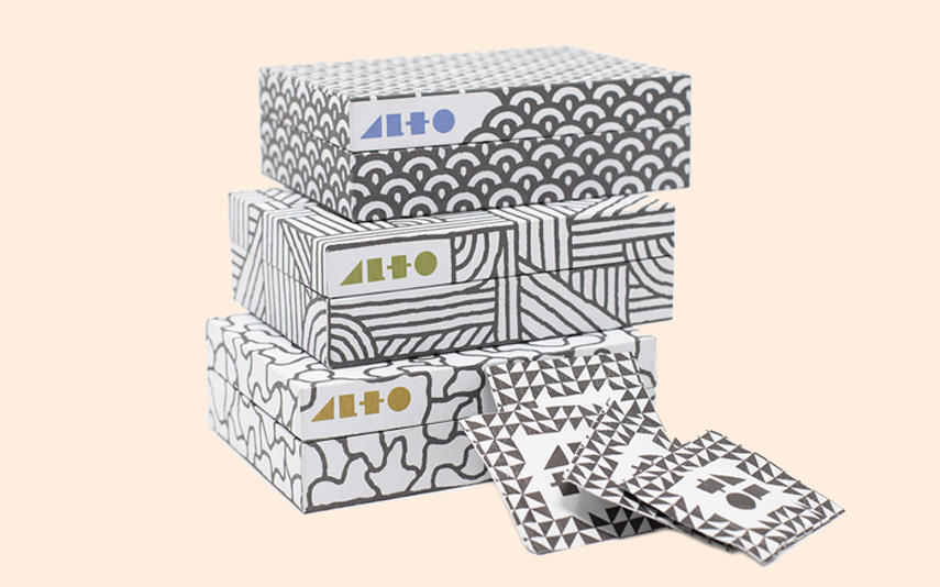 Boxes of CBD-infused honey, salt, and olive oil from Alto Essentials