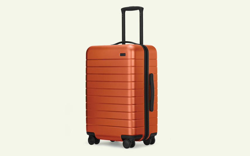 Orange carry-on suitcase from Away