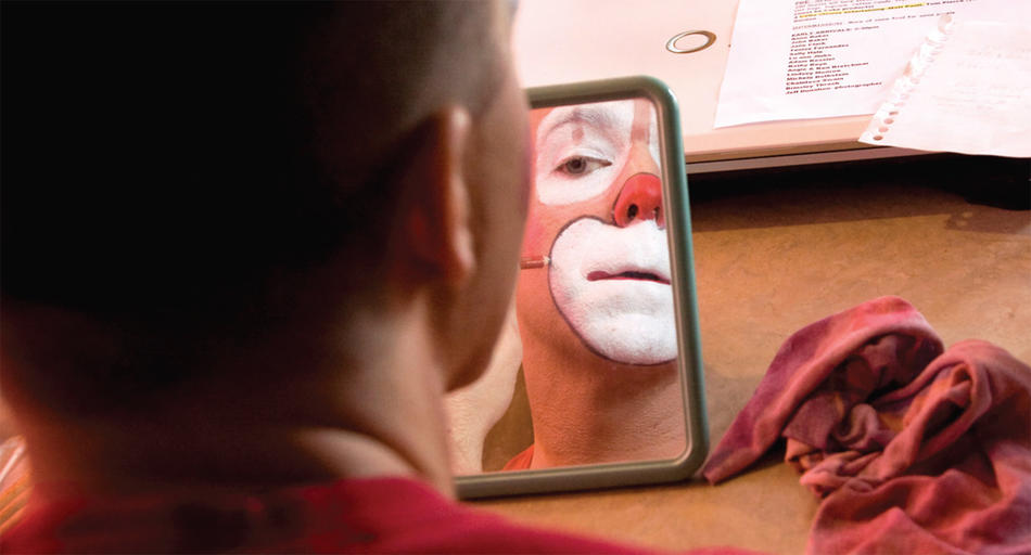 Photo by Jerry Siegel of a Big Apple Circus clown putting on makeup