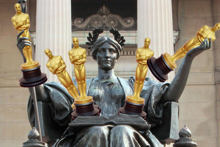 Columbia Alma Mater statue holding Oscar statues