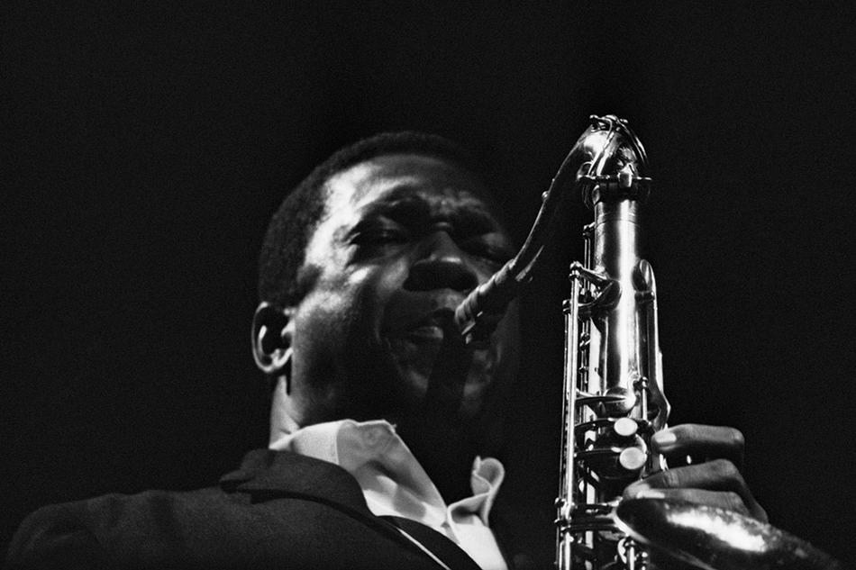 Photo of John Coltrane playing saxophone