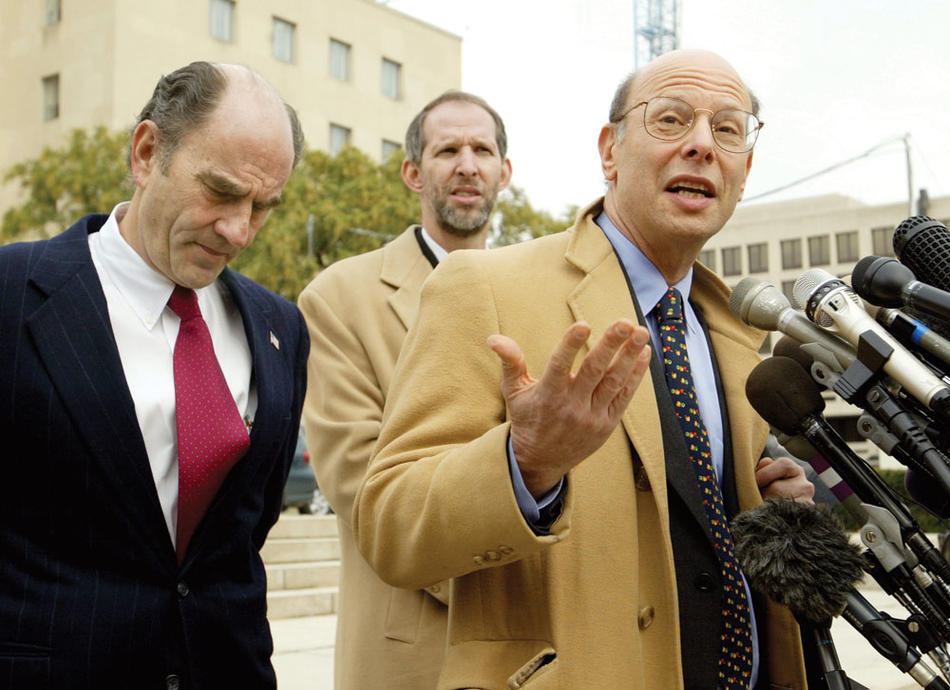 Michael Ratner speaks to reporters in late 2002, outside a D.C. court where he argues unsuccessfully that terrorism suspects have the right to challenge their detentions. He is pictured with cooperating attorneys Tom Wilner, of Shearman & Sterling (from left), and Joe Margulies, a law professor at Northwestern University