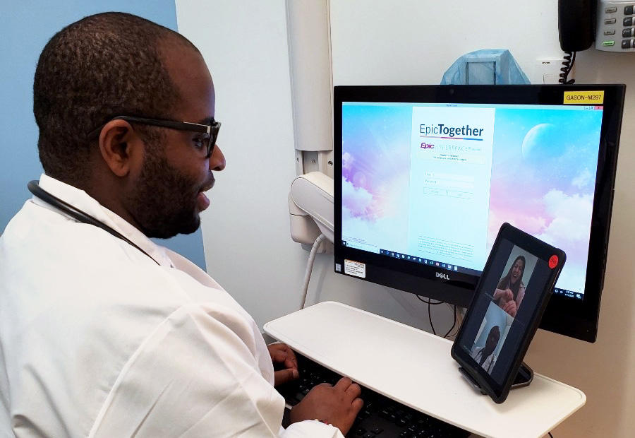 A Columbia University nurse videoconferencing
