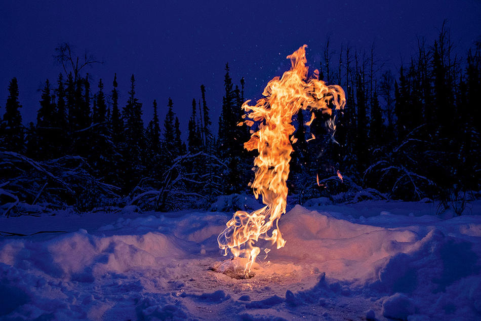PHOTO OF  FLAMMABLE METHANE BUBBLES UP FROM THAWING PERMAFROST, BY KATIE ORLINSKY