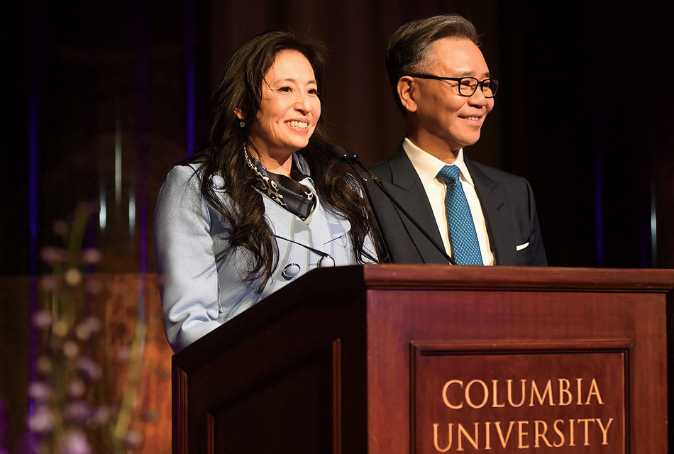 Shirley and Walter Wang speaking at a Columbia University event