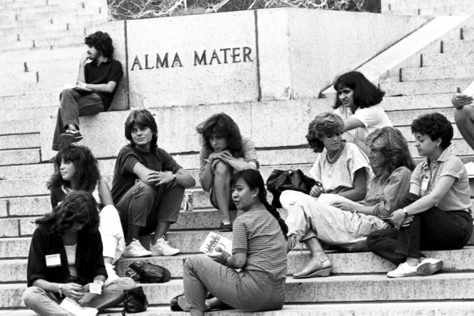 Female members of Columbia College's first coed class on the steps of Low Library in 1983