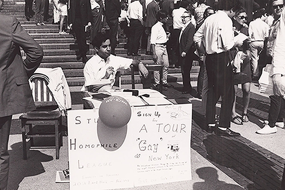 A member of Columbia University's student homophile league signs people up for a tour on Low Plaza circa the 1970s