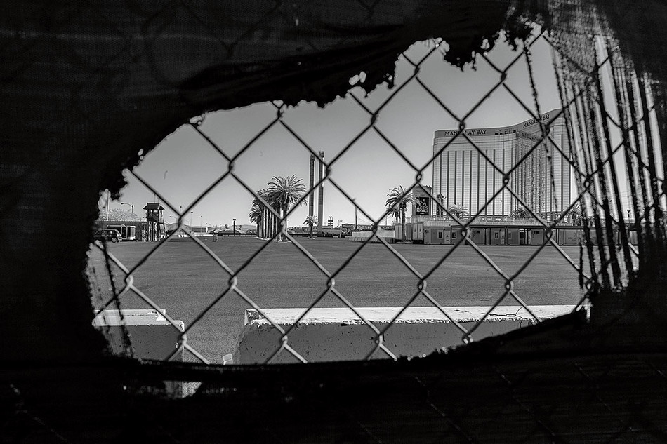 Mandalay Bay Hotel in Paradise, Nevada seen through a wire fence