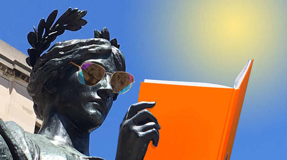Columbia's Alma Mater statue reading a book under the sun and wearing sunglasses