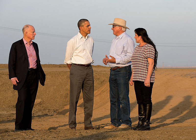 Barack Obama standing in a field with Obama with farmer Joe Del Bosque, who was interviewed for the oral-history project