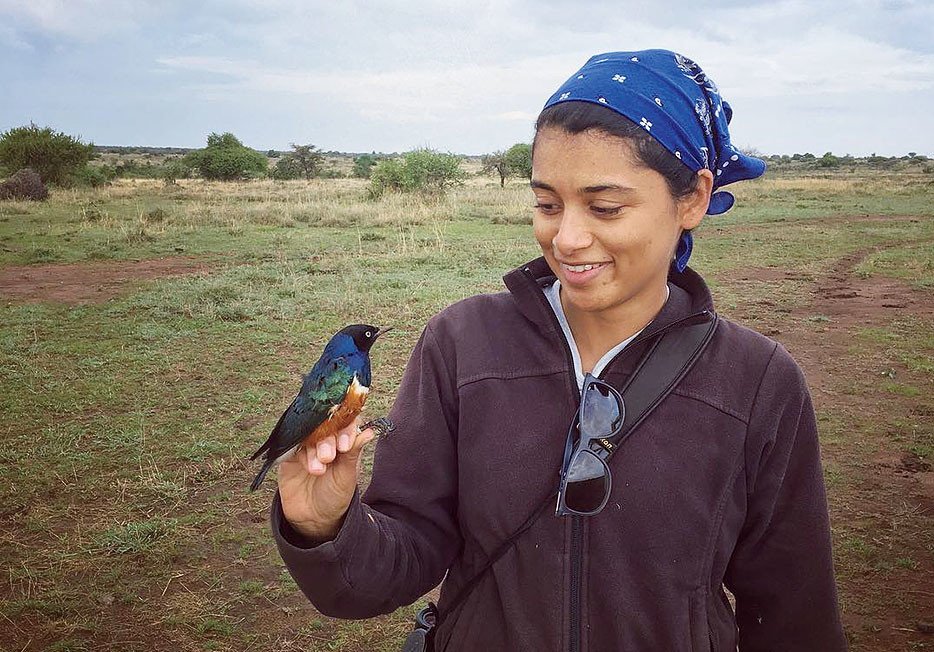 Shailee Shah holding a superb starling in East Africa