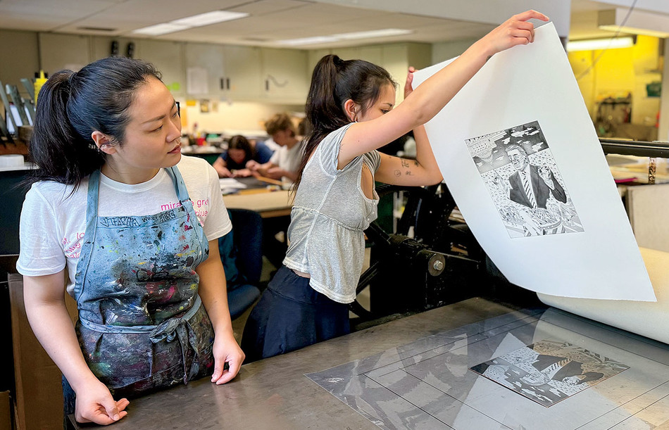 Students use an etching press at the LeRoy Neiman Center for Print Studies at Columbia University