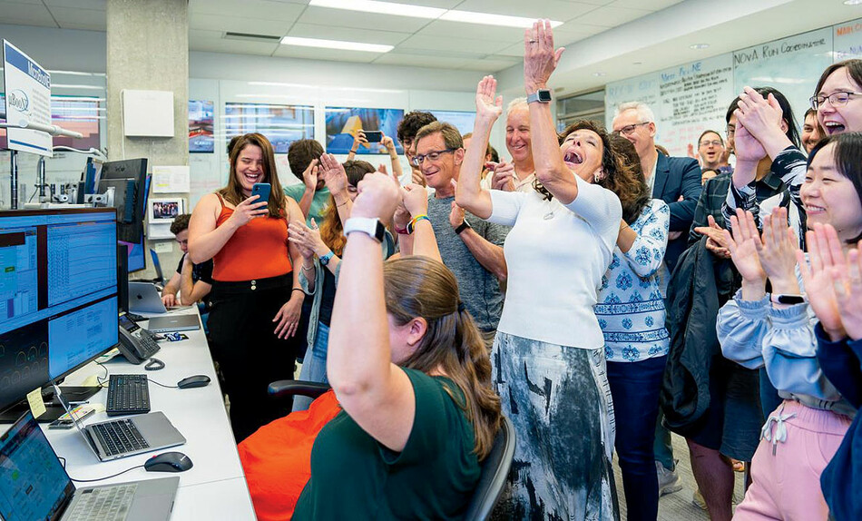 Fermilab scientists celebrate the activation of a new particle detector