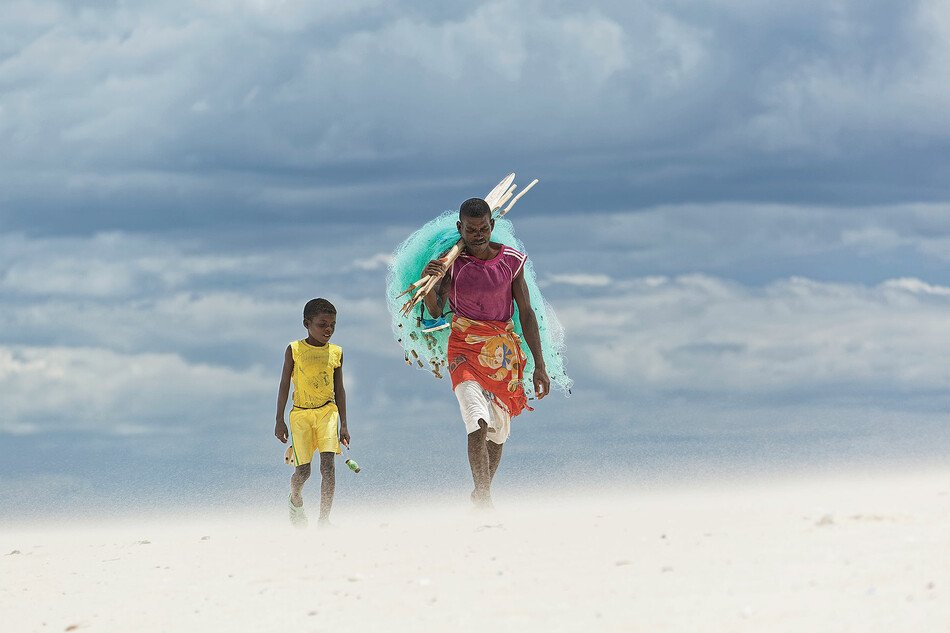 A man and child in a Madagascar fishing community
